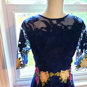 New never worn! Navy lace with pink and cream flower detail.